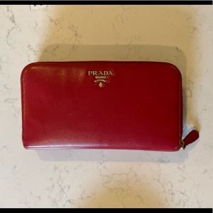 Prada Large Saffiano Zip Around Leather Wallet in Red